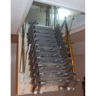 Автоматическая чердачная лестница в работе